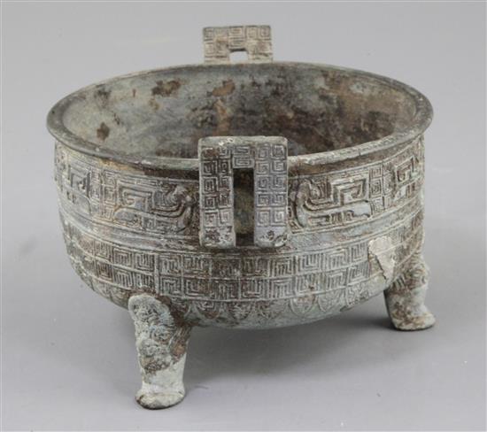 A Chinese archaic bronze tripod food vessel, Ding, probably Warring States period, 5th-2nd century B.C., 14.5cm, 9.5cm high, repair